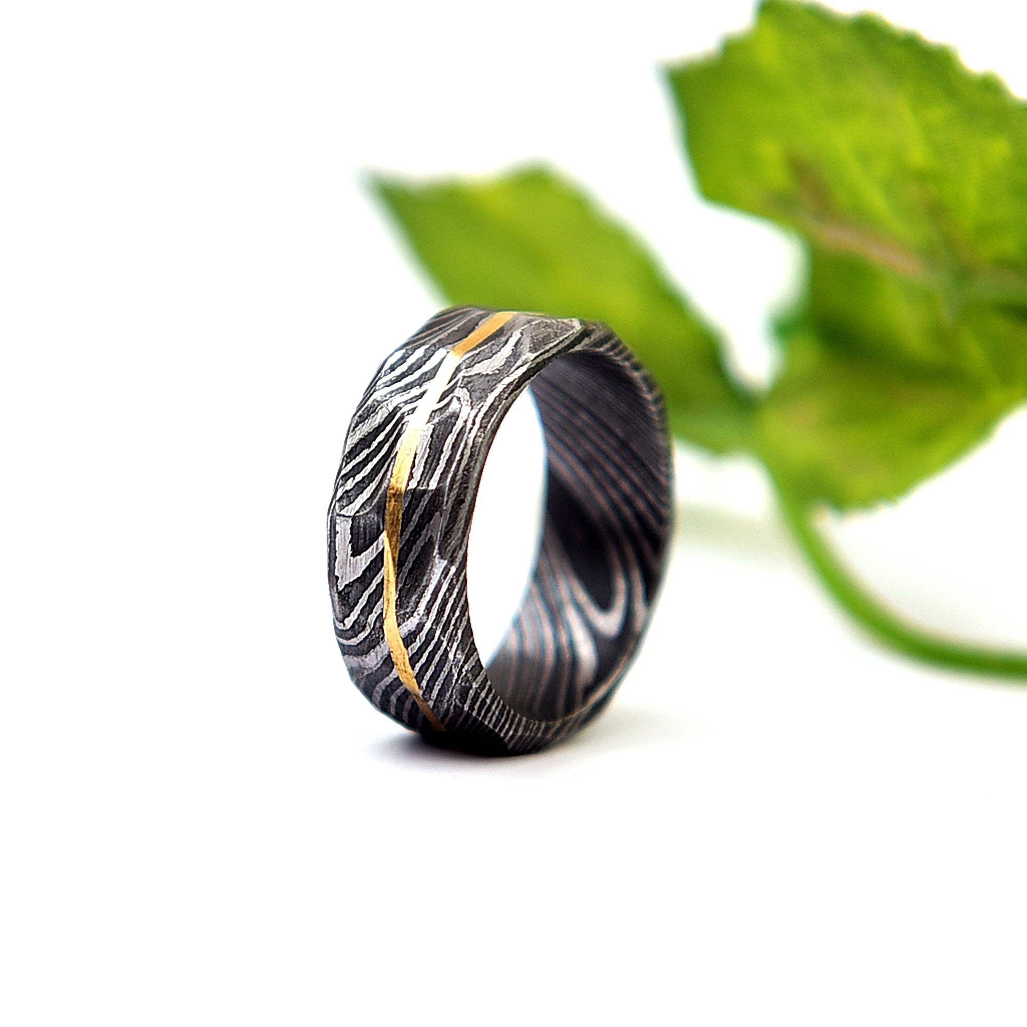 Handmade Damascus Steel Ring with Brass Lining: Hammered Rock Finish
