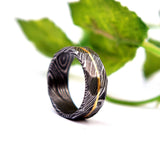 Handmade Damascus Steel Ring with Brass Lining: Hammered Rock Finish
